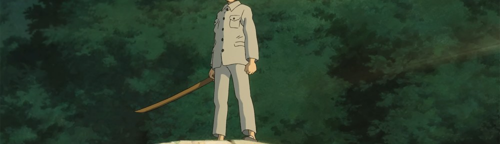 Mahito stands on a rock.