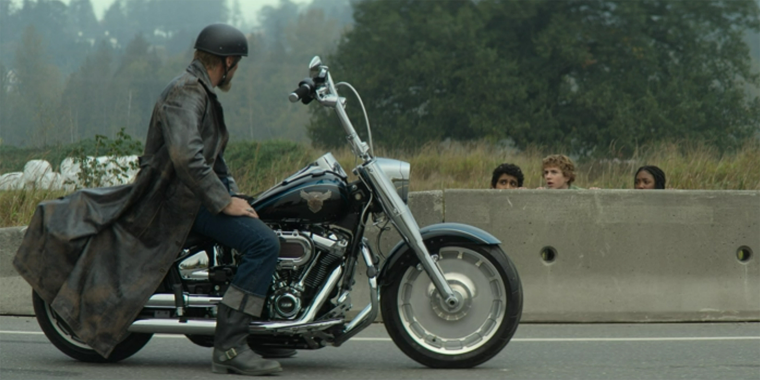 Aries on a motor cycle.