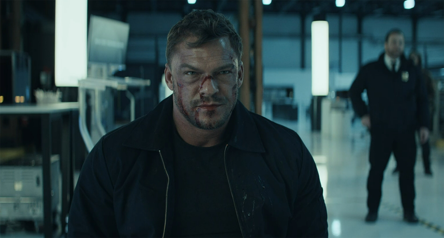 Reacher bloody and captured.