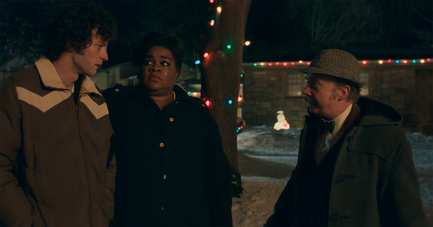 The core three come together in support during a moment of emotion.