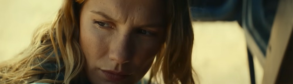 She looks out into the desert.