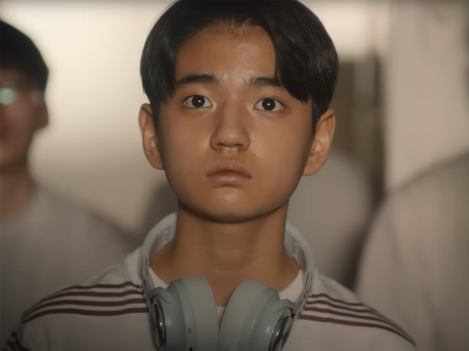 A young boy contemplates his future.