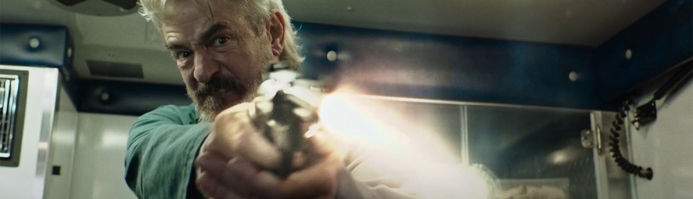 Dermot Mulroney fires a gun.