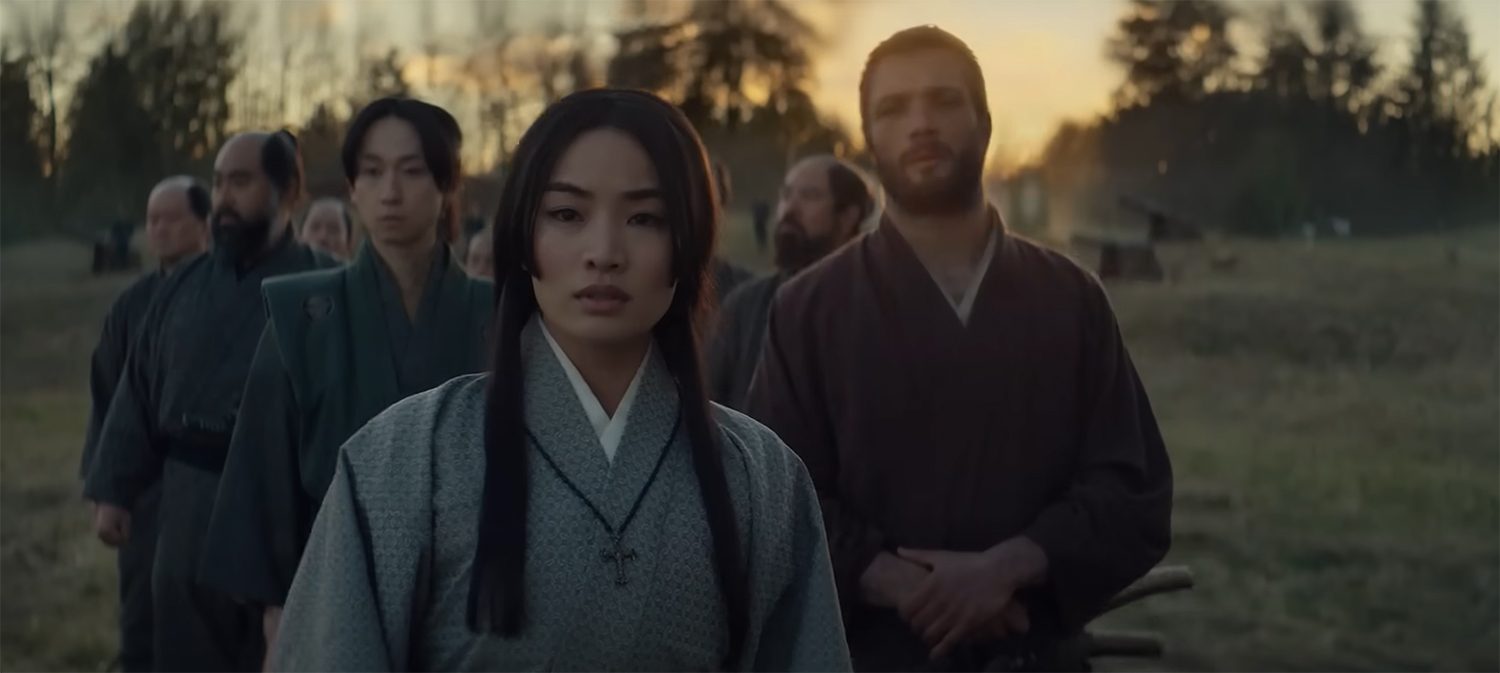 Mariko leads a procession.