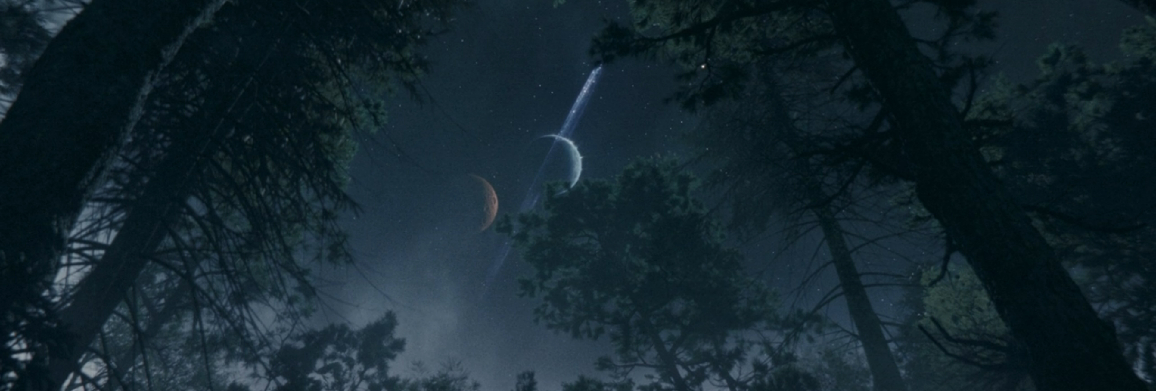 Twin moons loom overhead.