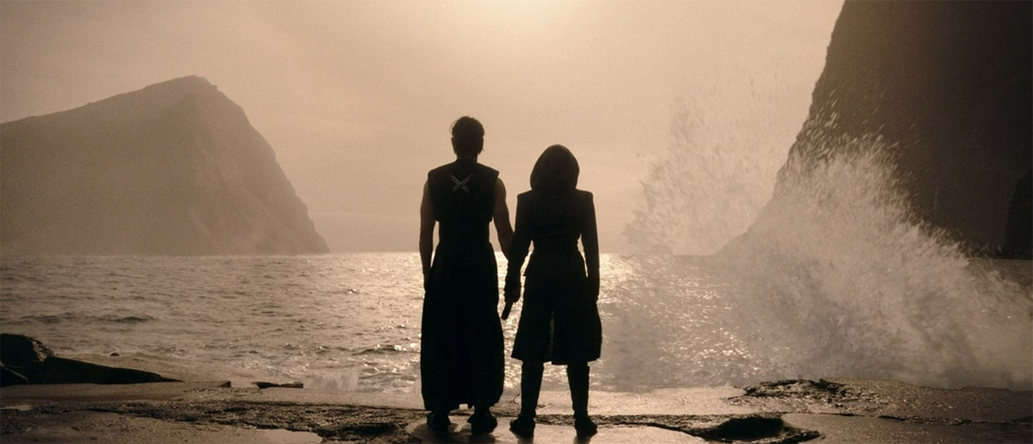 Qimir and Osha standing on an unknown planet