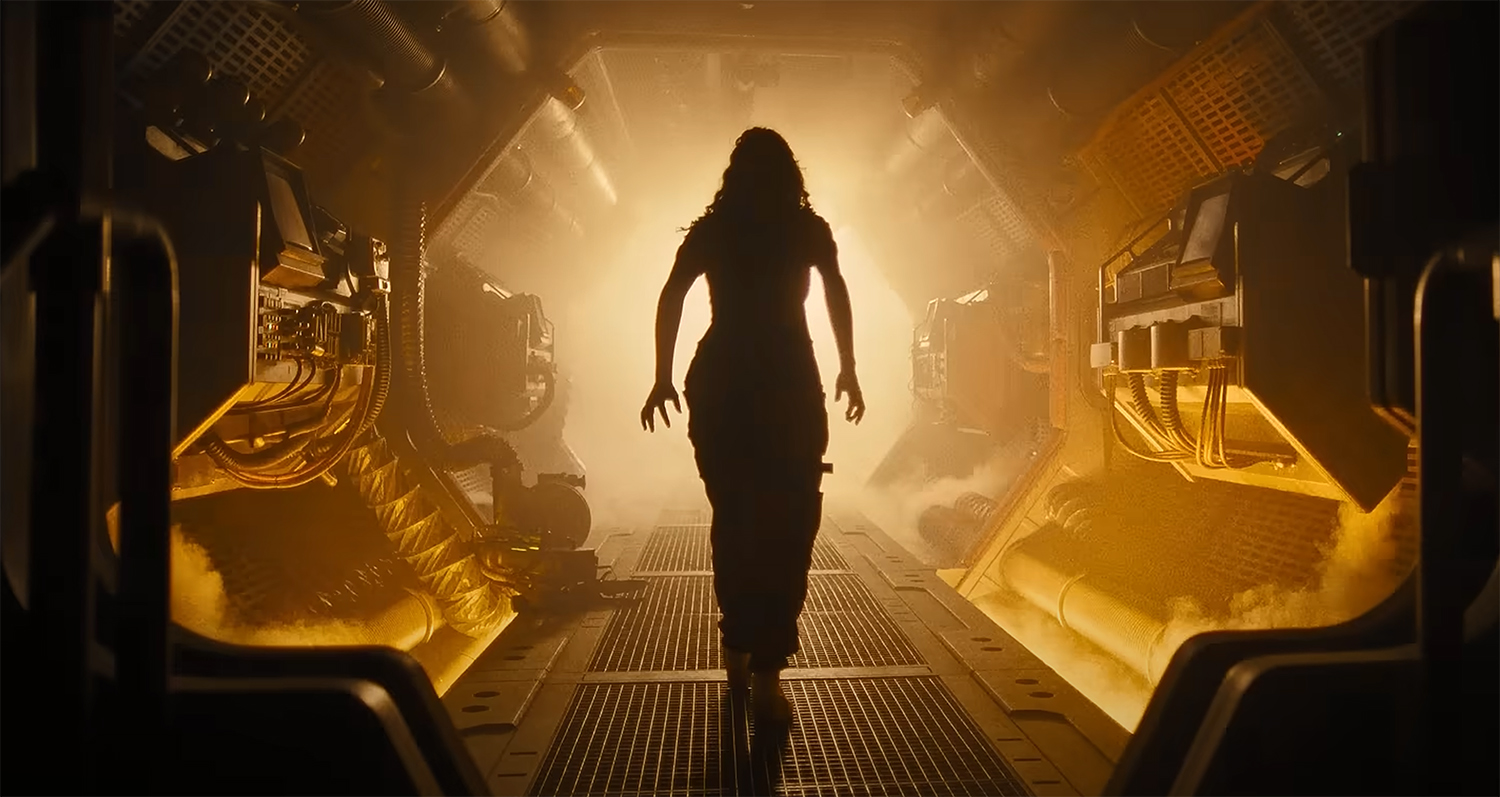 Walking into an illuminated hallway.