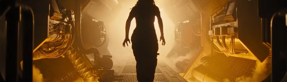 Walking into an illuminated hallway.