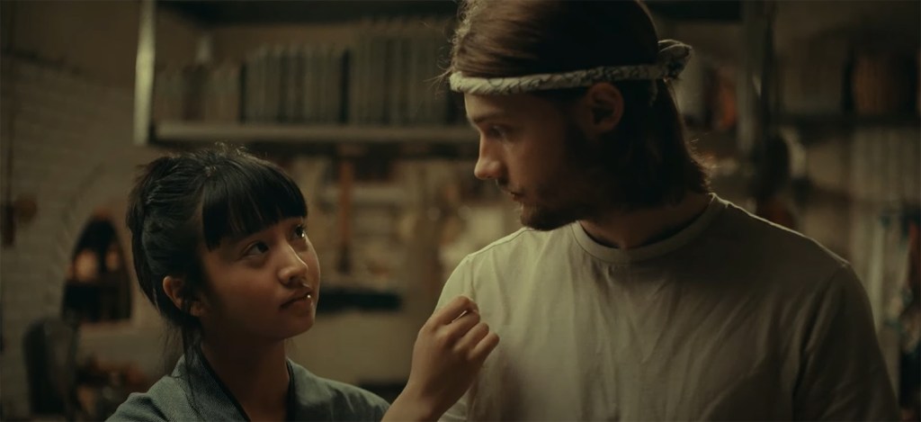 Kristófer and Miko touch.