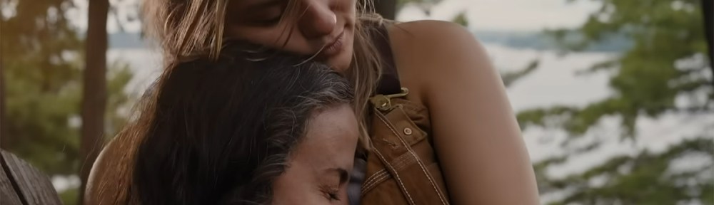 Elliott hugs her mum.