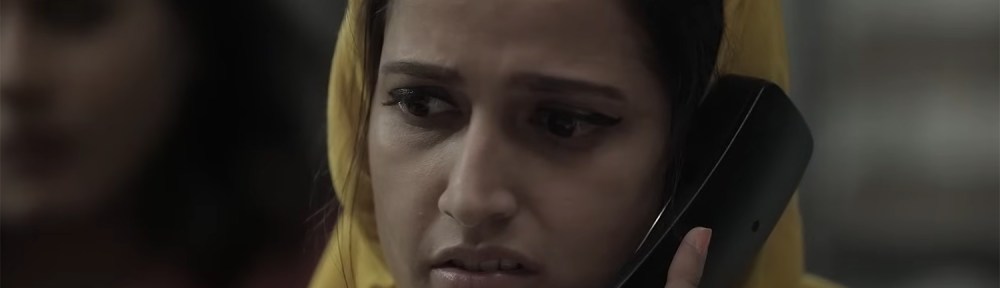 Aliah takes a phone call.