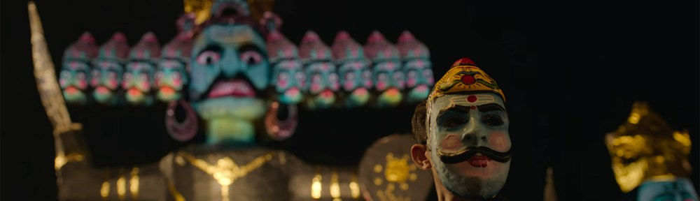 Prem hunts wearing a mask during a religious festival.