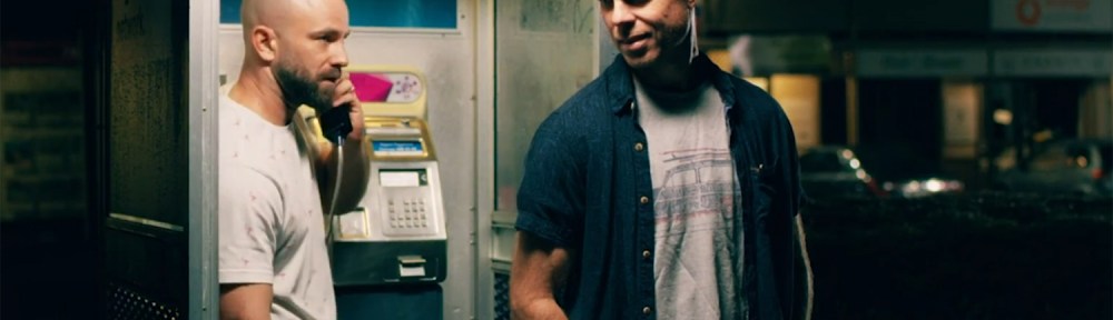 The cousins at a old pay phone.