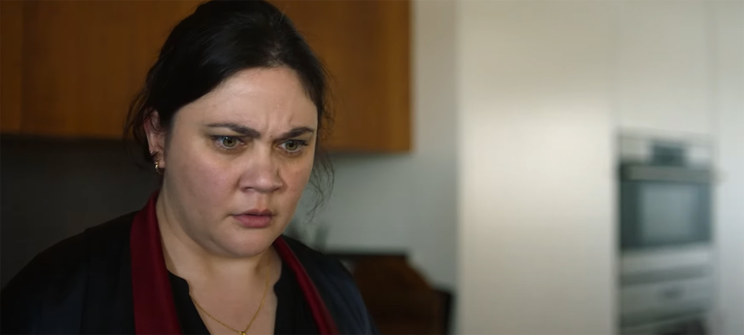 Sarah looks in horror