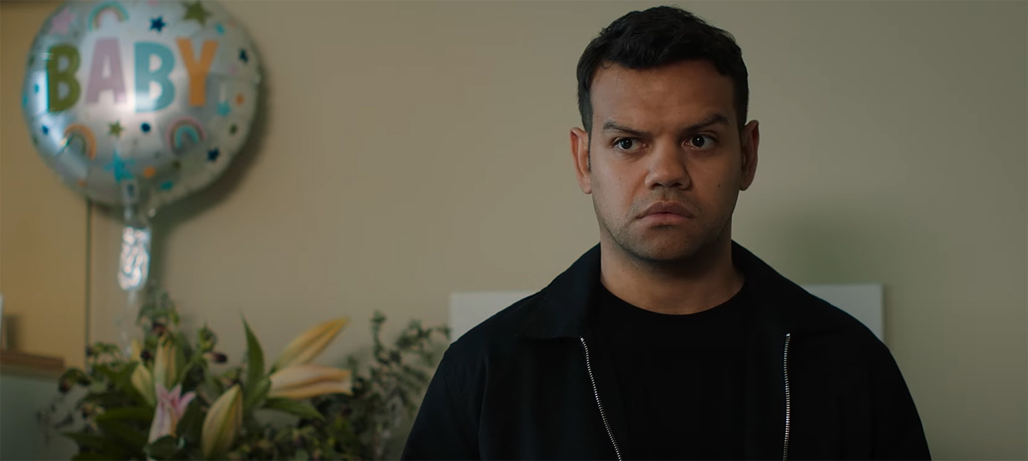 Fergus looks on not sure how to proceed.