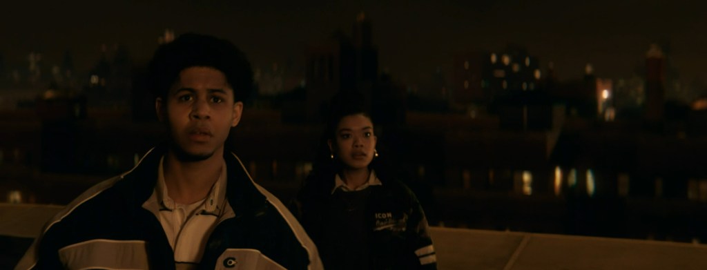 Vic watches the explosions.