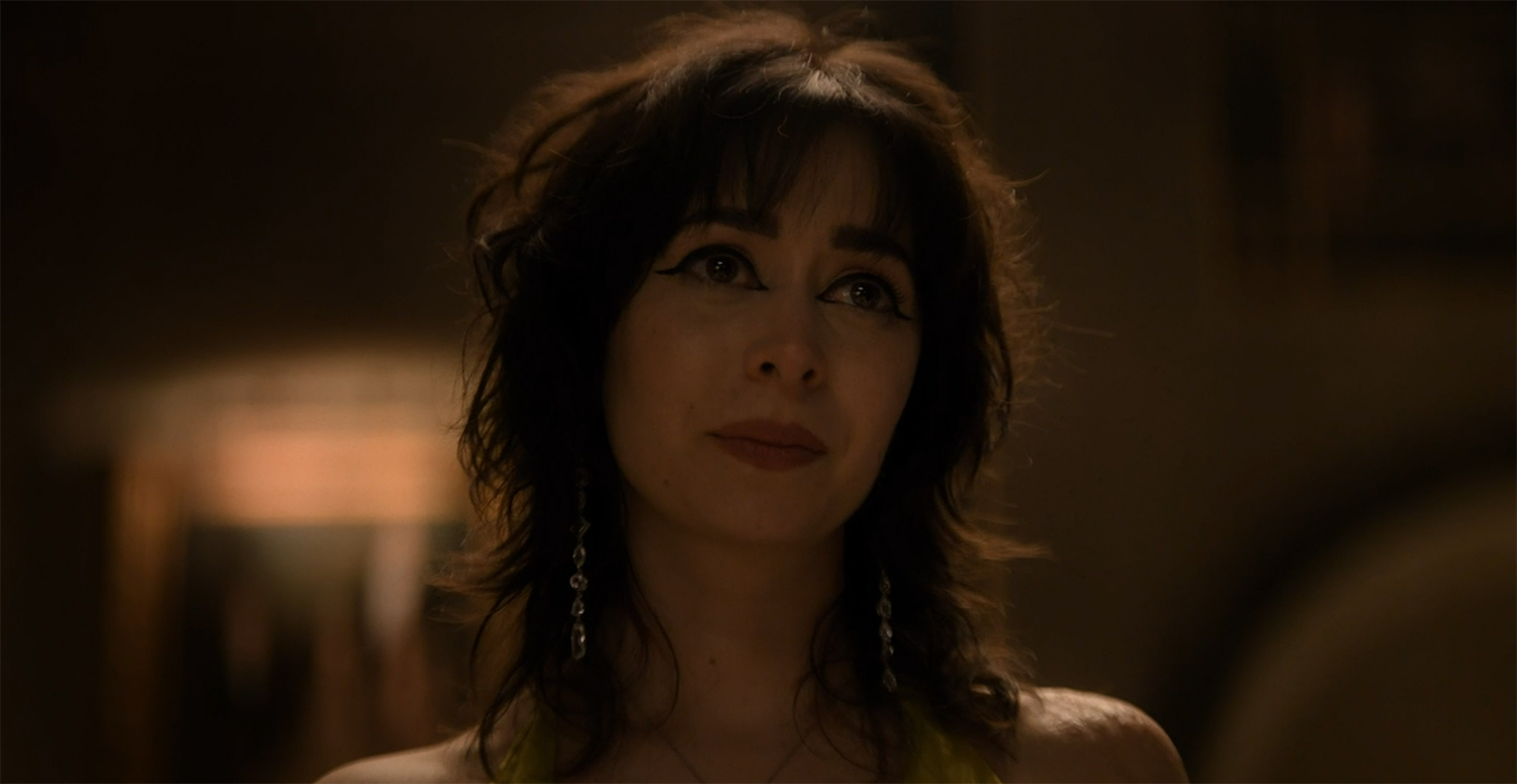 Sophia smiles at her family one last time.