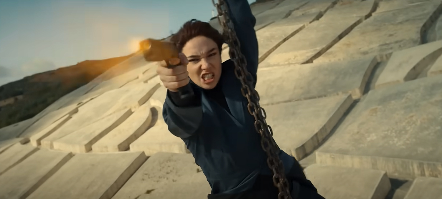 Diana ziplining while firing her gun.