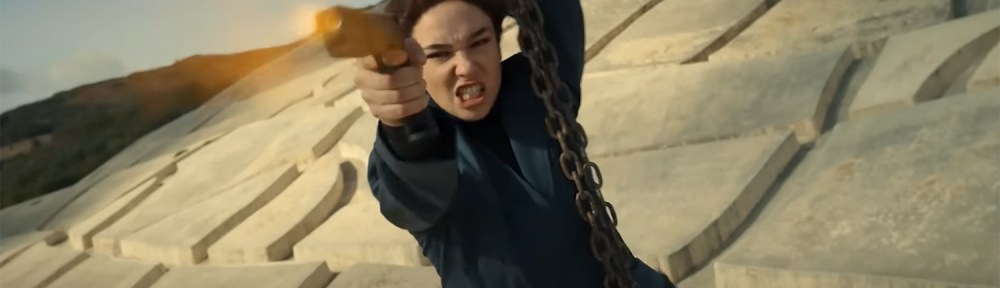 Diana ziplining while firing her gun.