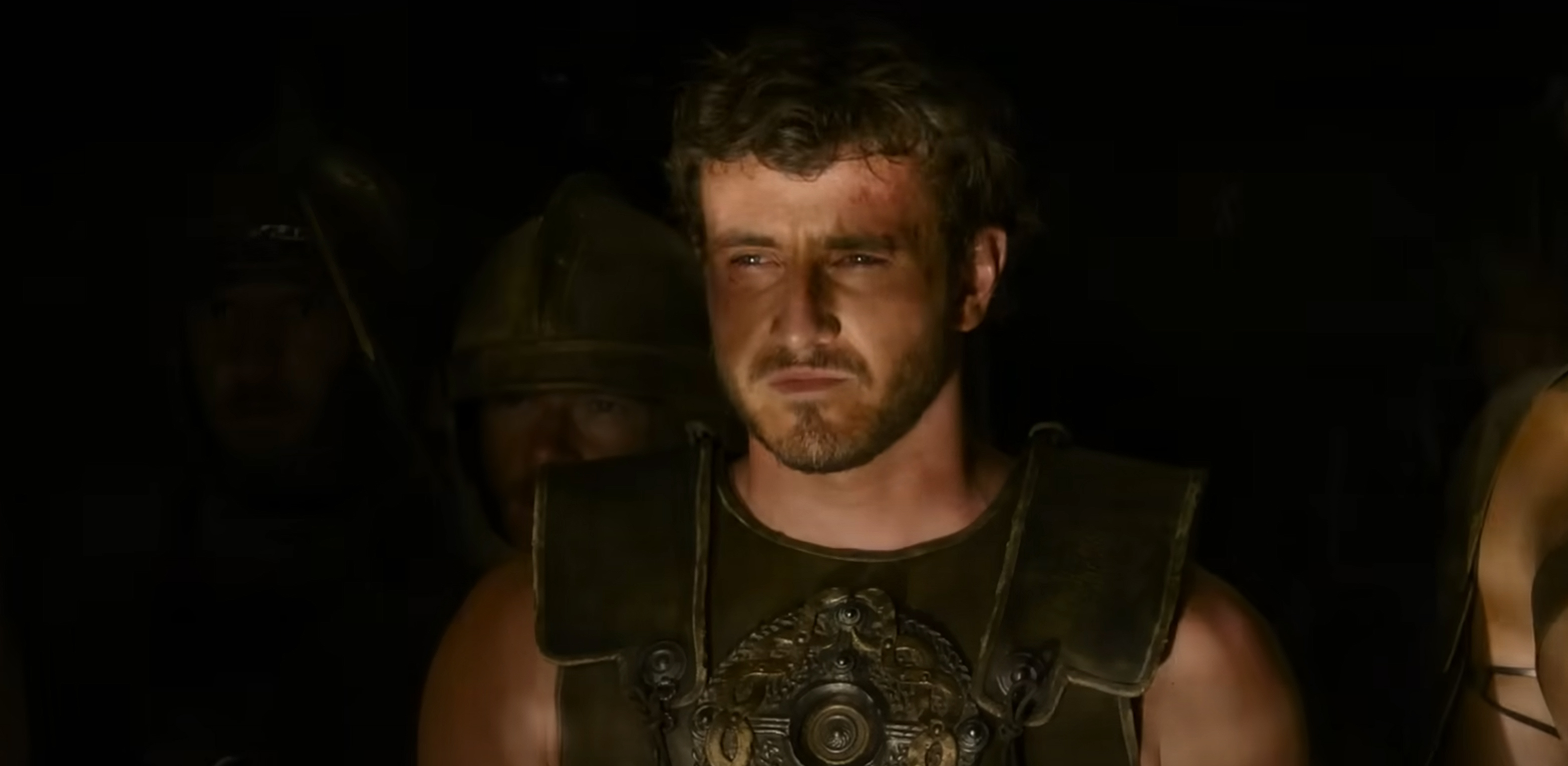 Lucius approaches the Colosseum