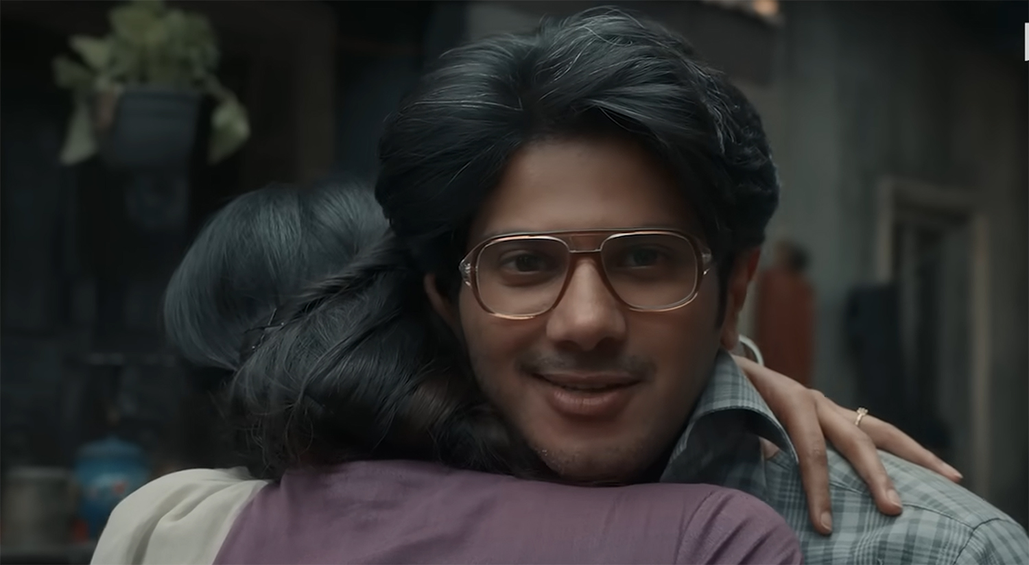 Baskhar Kumar hugs his wife.