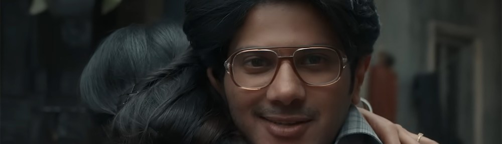 Baskhar Kumar hugs his wife.