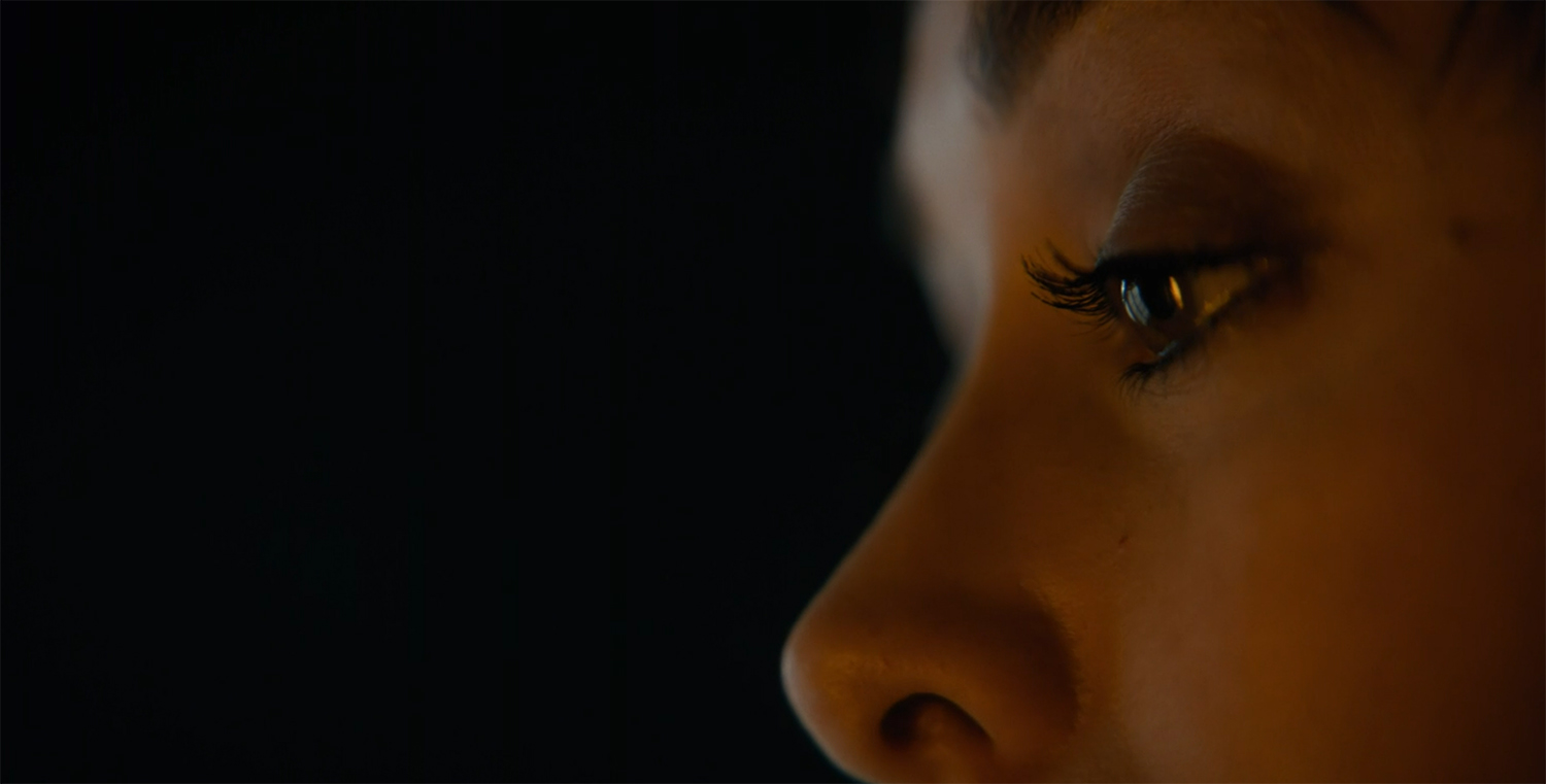 Sofia watches her house burn.