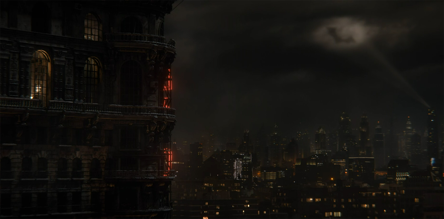 The Bat Signal appears in the sky.