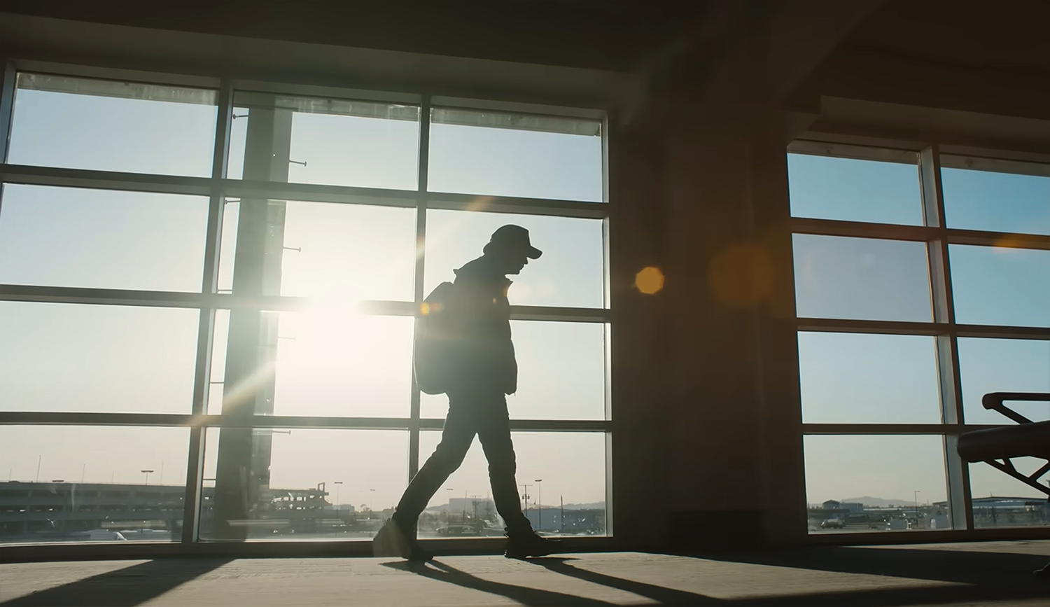 the traveller walks in the shadows.