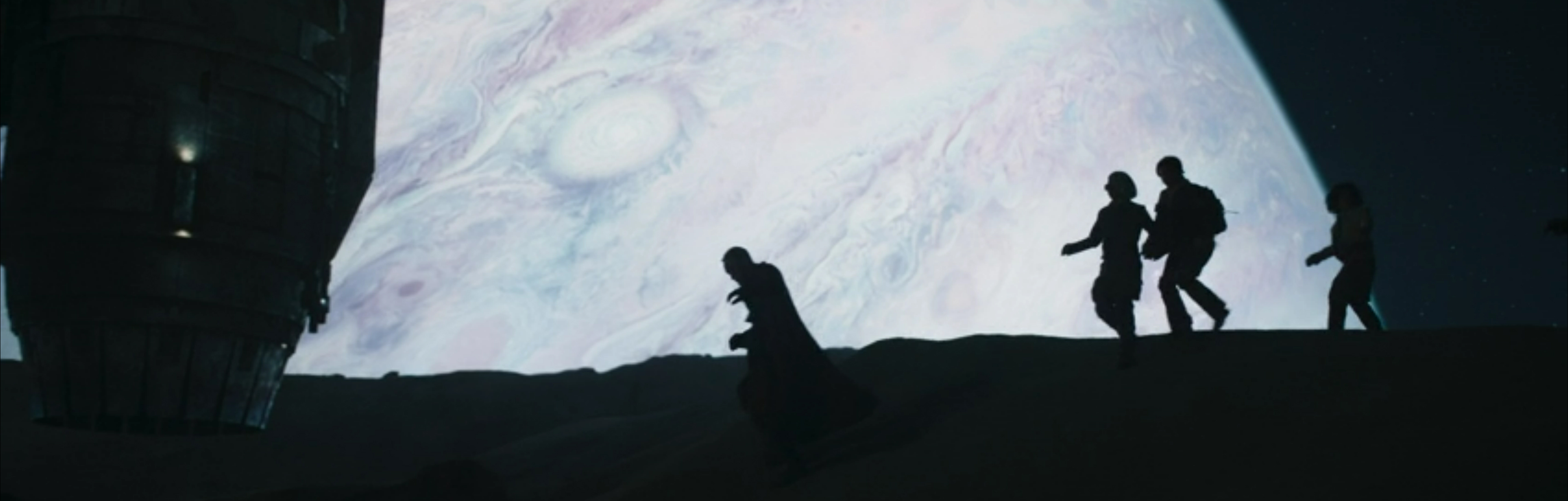 People run with a gas giant hanging in the background.