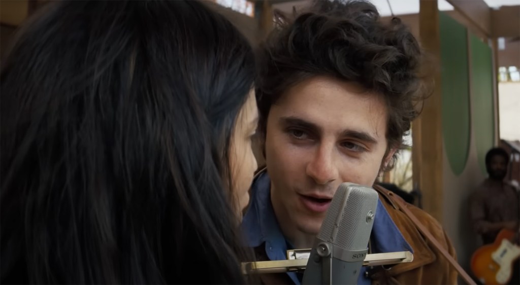 Bob performs on stage. 