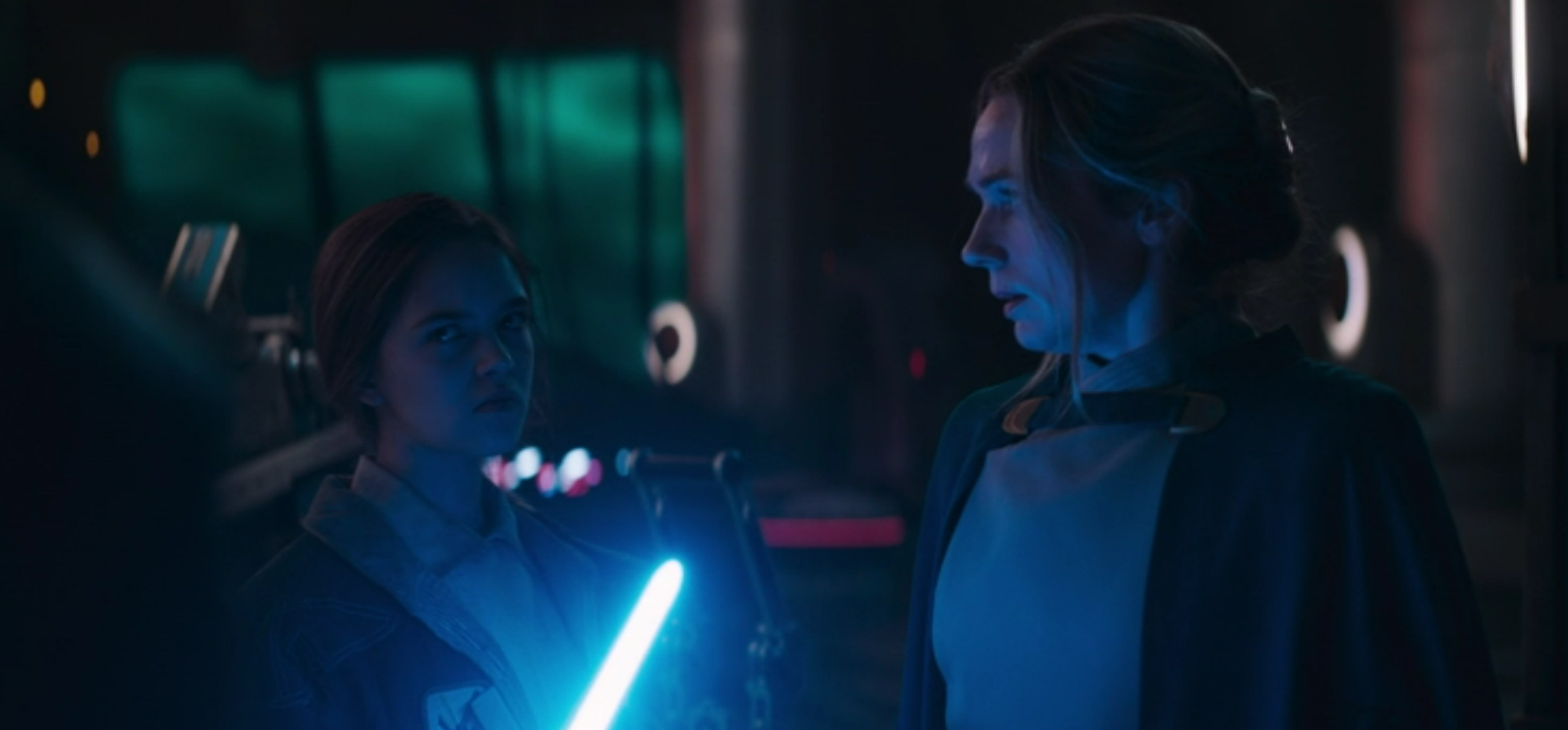 A blue lightsabre threatens civilians.