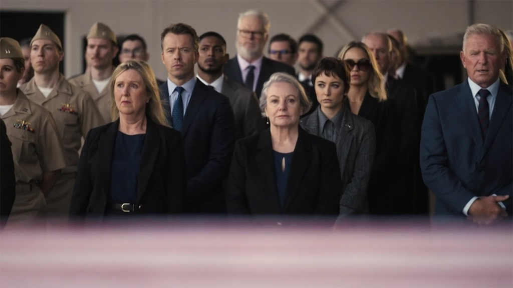 Everyone lined up for a funeral. 