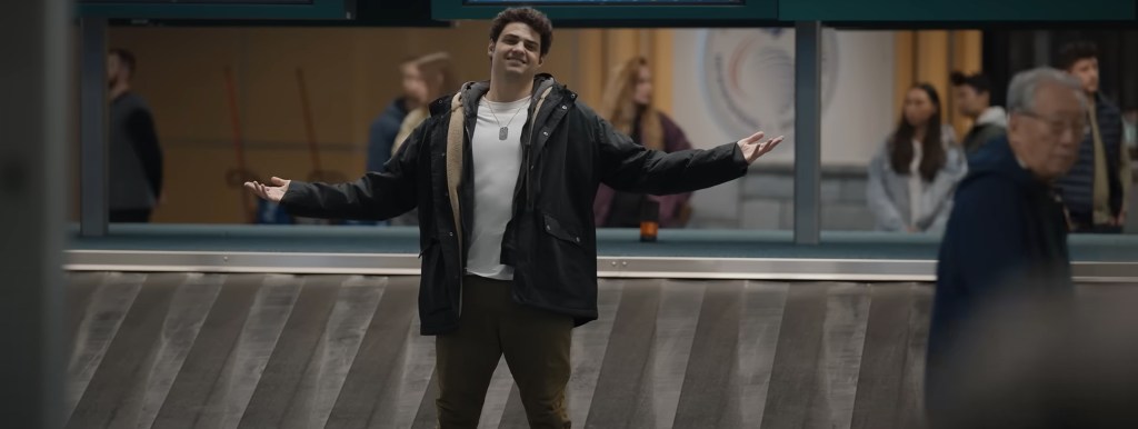 Owen says hello by opening up his arms. 