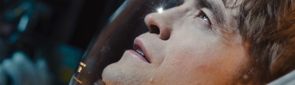 Mickey looks up in a spacesuit.