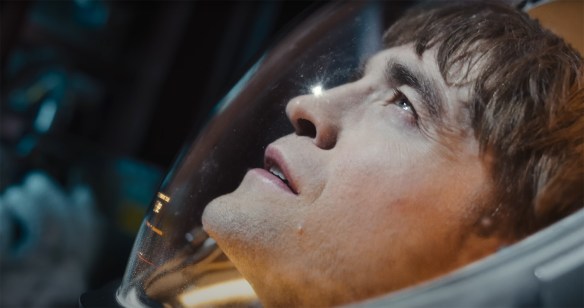 Mickey looks up in a spacesuit.