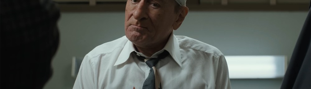 Robert De Niro with a band aid on his head.