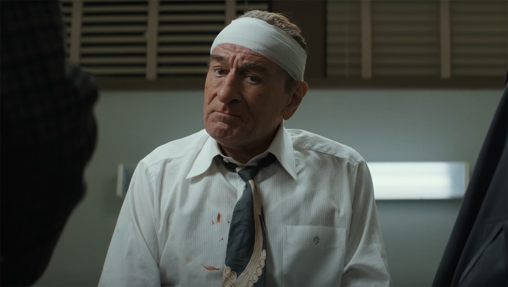 Robert De Niro with a band aid on his head. 