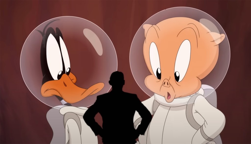 Daffy Duck and Porky Pig in space suits. 