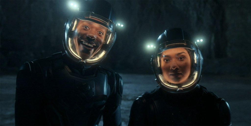 The Doctor and Belinda in space suits. 
