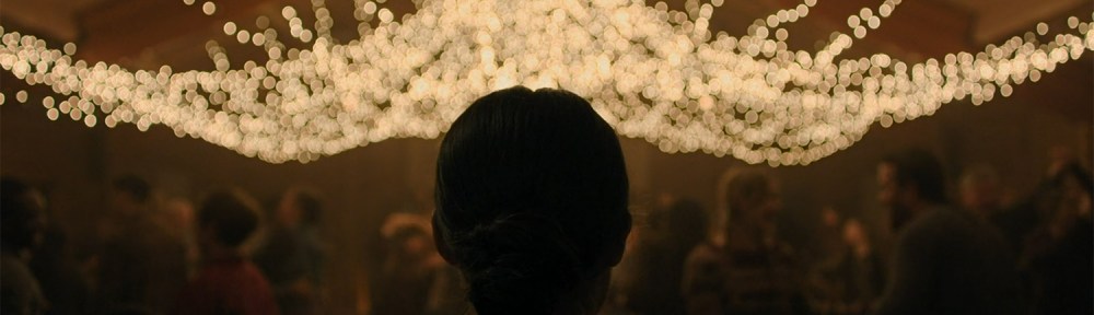 Arriving in a barn dance with lights across the ceiling.