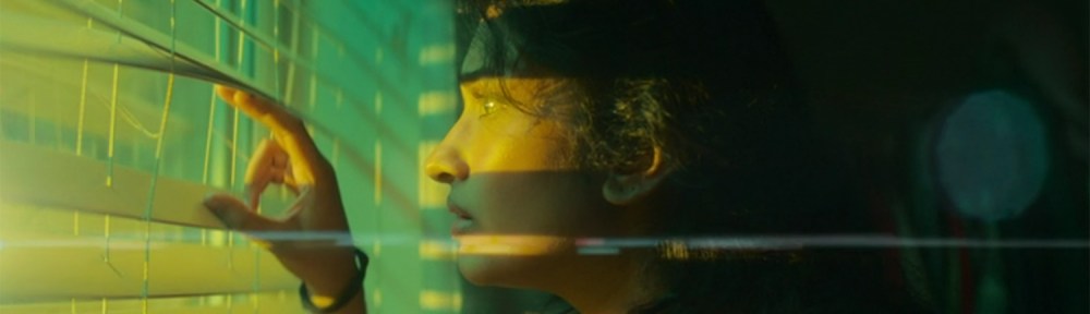 Belinda sees a rocket land next to her house.