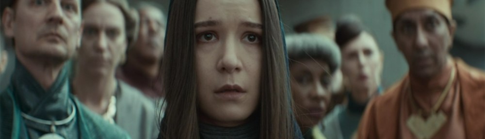 Kleya looks on as the Empire takes away Luthen.