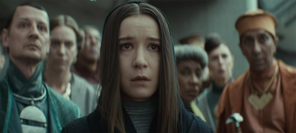 Kleya looks on as the Empire takes away Luthen.