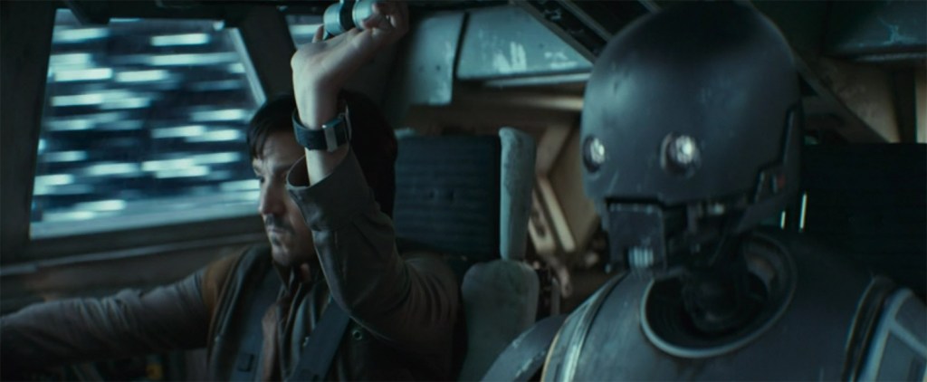 Cassian and K-2SO fly the ship.