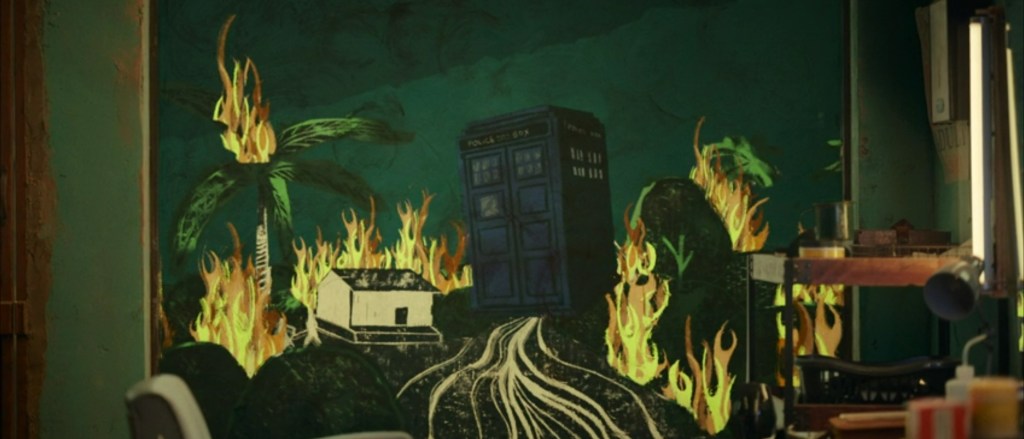 The TARDIS putting out a fire.