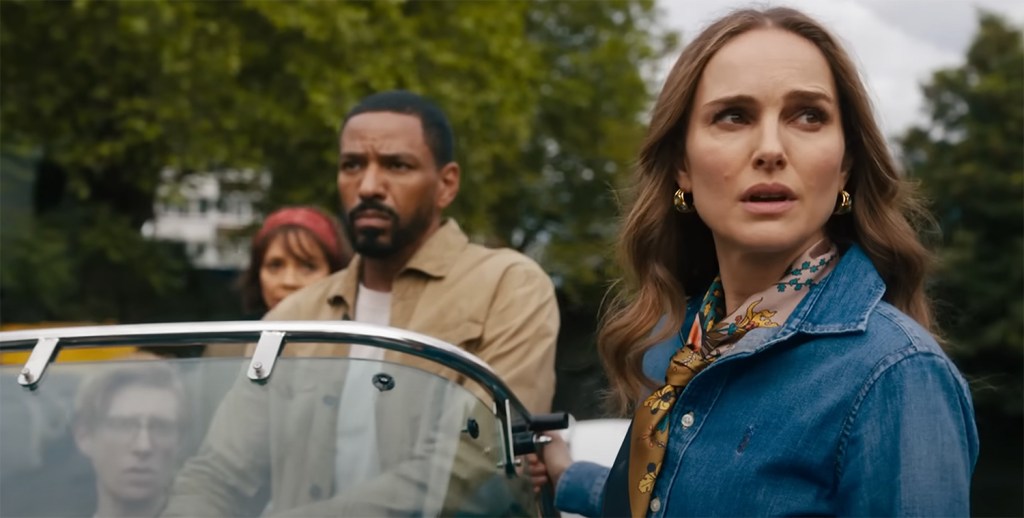 The cast on a speed boat in a canal. 
