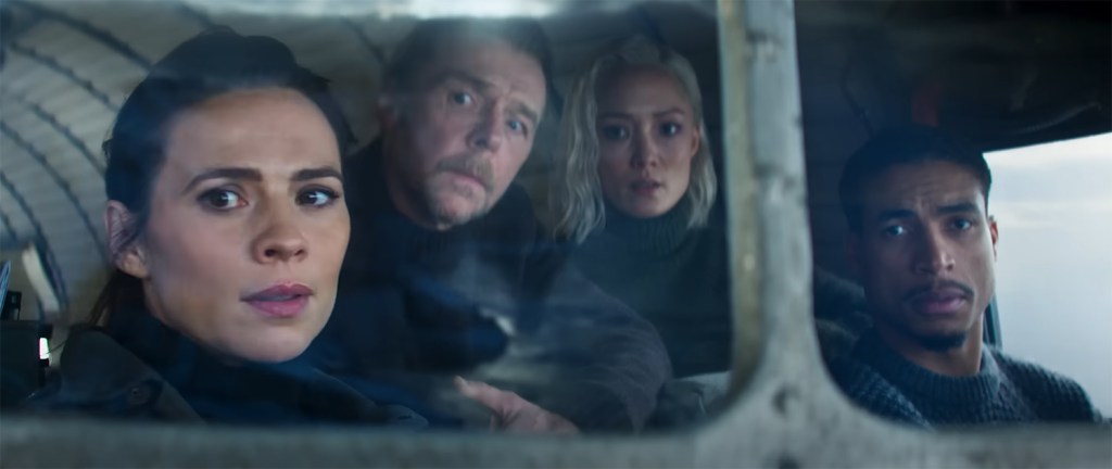 The team in a plane. 