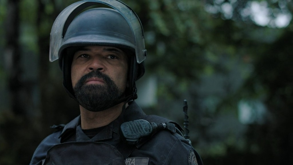 Isaac assesses the scene. 