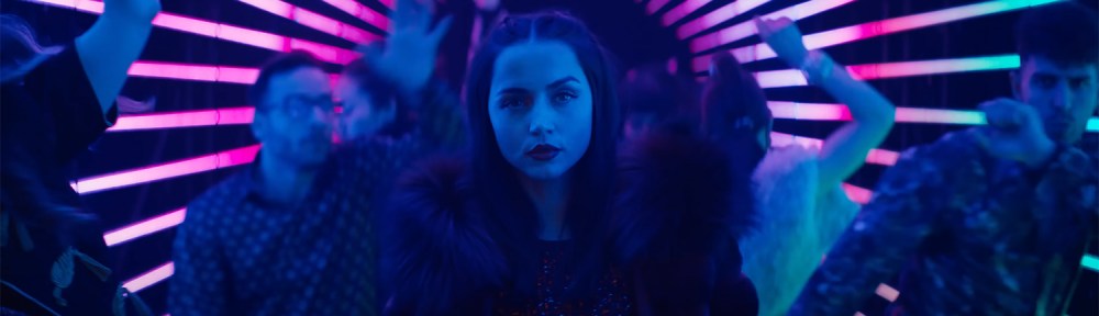 Eve walks into the club.